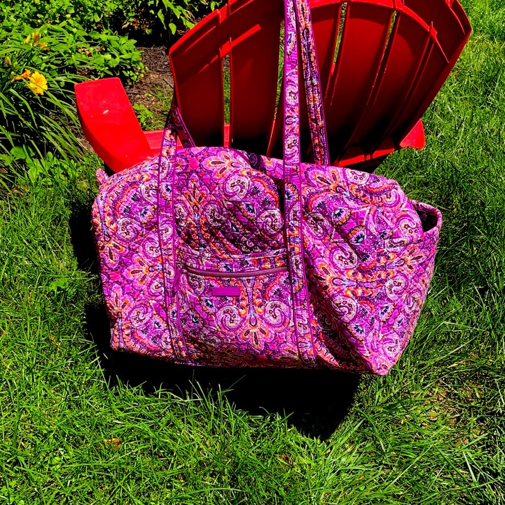In new condition Vera Bradley duffel bag